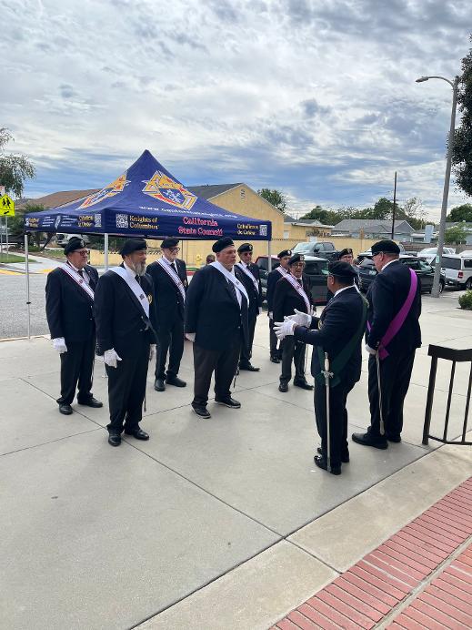 Knights of Columbus Color Corps members assembled outside St. Pancratius Catholic Church